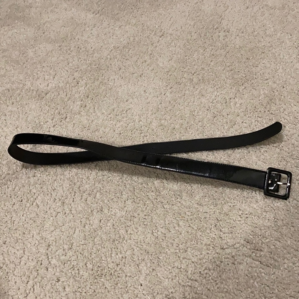 Shiny pleather belt. 33.75”